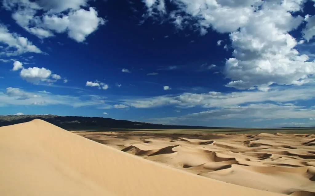 Randonnée à dos de méhari dans les dunes